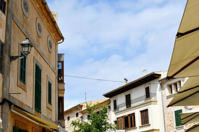 Low angle view of buildings against sky