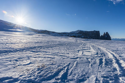 Scenic view of snow covered mountain against sky