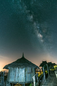 Low angle view of building against sky at night