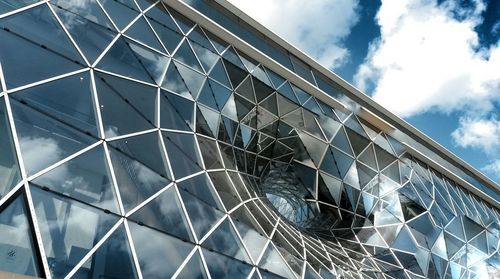 Low angle view of modern building against sky