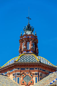 Low angle view of cathedral dome against clear blue sky