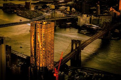 Aerial view of illuminated city at night