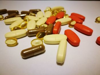 Close-up of colored pencils on white background