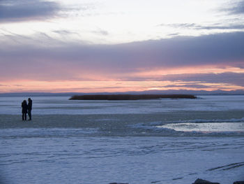 Scenic view of sea at sunset