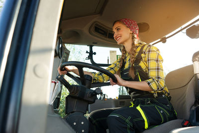 Woman sitting in bus