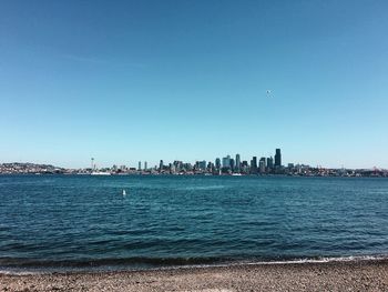 View of cityscape against clear sky