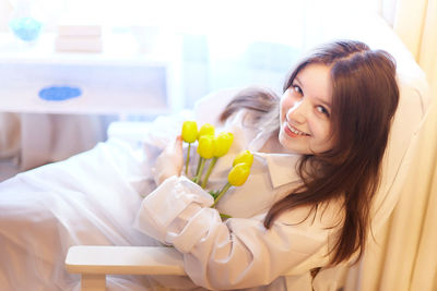 Young woman drinking glass