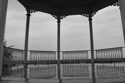 Low angle view of bridge over sea against sky