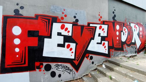 Close-up of graffiti on wall