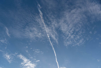 Low angle view of vapor trail in sky