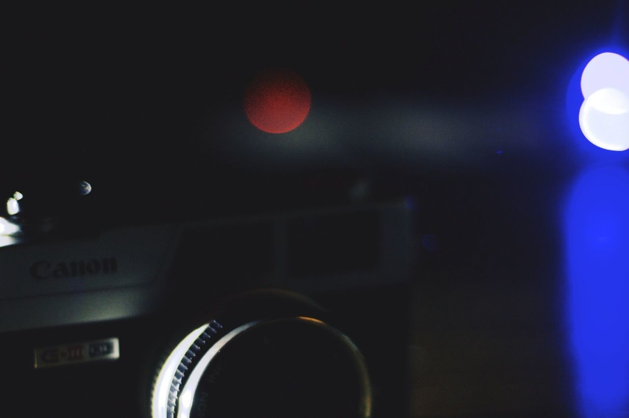 illuminated, night, lighting equipment, indoors, circle, technology, glowing, dark, electricity, light - natural phenomenon, electric light, low angle view, light, moon, no people, close-up, defocused, lit, sky, red