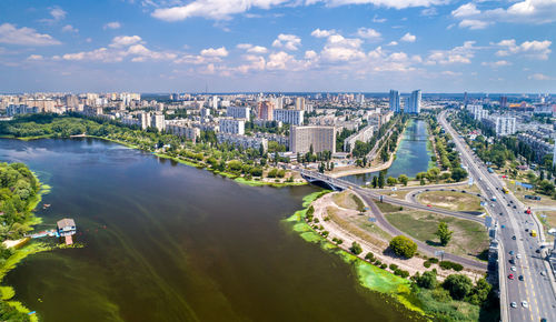 High angle view of bridge and buildings against sky