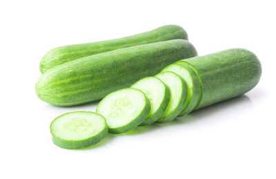 Close-up of green pepper against white background