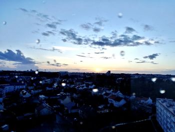 High angle view of cityscape against sky during sunset