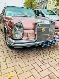 Vintage car on street in city