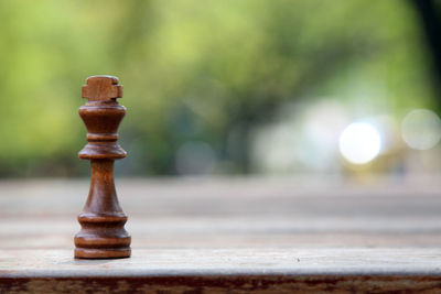 Close-up of chess piece on table