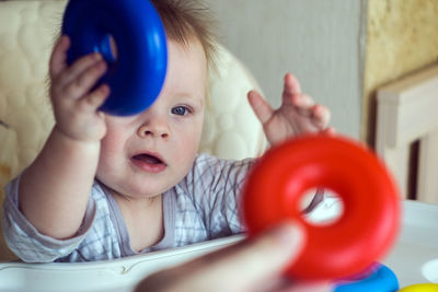 Portrait of cute baby girl at home