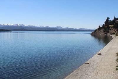 Scenic view of sea against clear blue sky