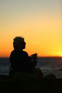 Scenic view of sea at sunset