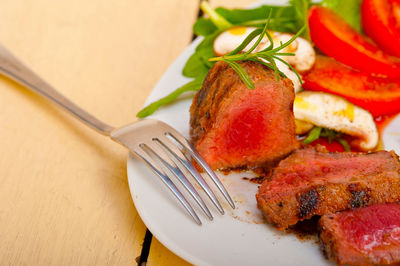 Close-up of food in plate on table