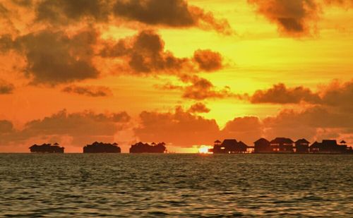 Scenic view of sea at sunset