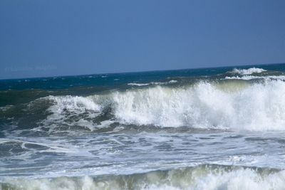 Waves splashing on rocks