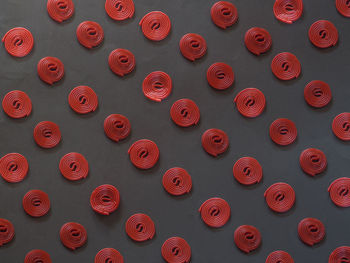 High angle view on red candies on table