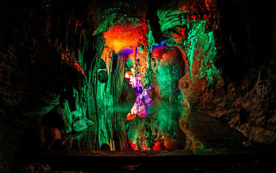 Close-up of multi colored water in cave