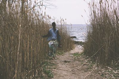 Silhouette of woman in sea