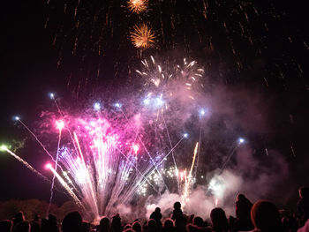 Firework display at night