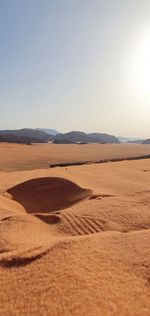 Scenic view of desert against clear sky