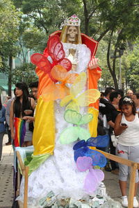 Full length of boy holding umbrella