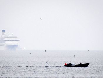 Boat sailing in sea