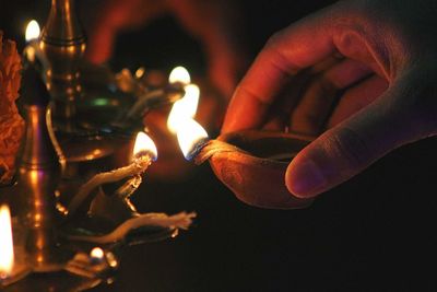 Close-up of a hand holding lantern