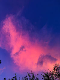 Low angle view of dramatic sky during sunset
