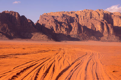 Scenic view of desert against sky