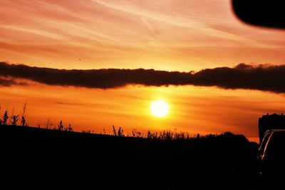 Scenic view of landscape against sky during sunset