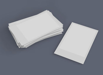 High angle view of open book against white background