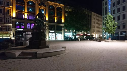 Illuminated street at night