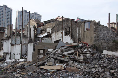 Abandoned buildings against sky