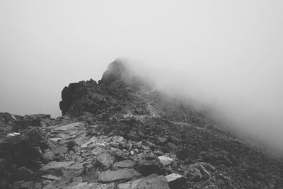 Scenic view of mountain during foggy weather