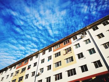 Low angle view of residential building against sky