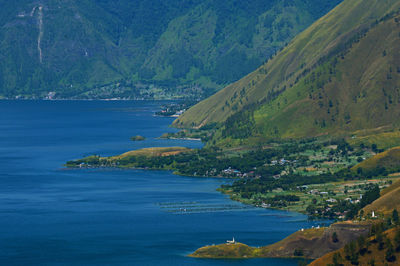 Scenic view of sea and mountains