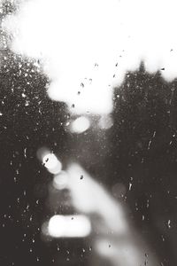 Close-up of water drops on glass