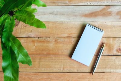 High angle view of leaf on cutting board