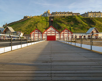 Saltburn by the sea pier looking towards the cliff lift which dates from 1884