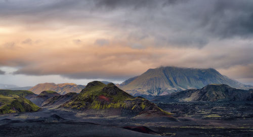 Scenic view of mountains against sky during sunset