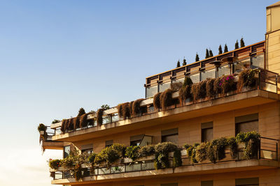 Low angle view of building against clear blue sky