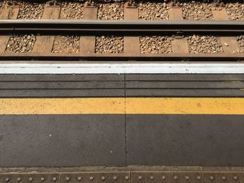 High angle view of railroad track by platform