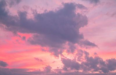 Low angle view of dramatic sky during sunset